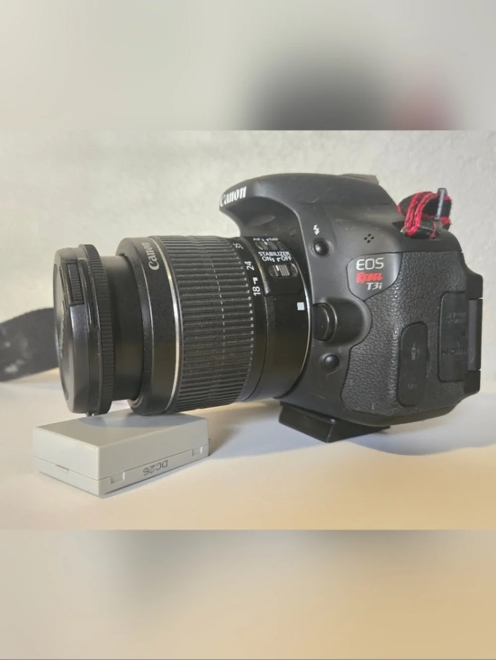Canon EOS Rebel T3i DSLR Camera w/ Lens & Charger Bundle